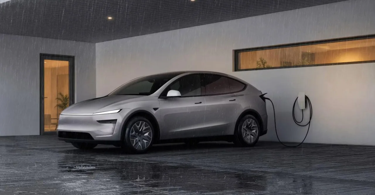Model 3 e Model Y estacionados ao lado de um Powerwall 3, conectados a uma casa que recebe energia